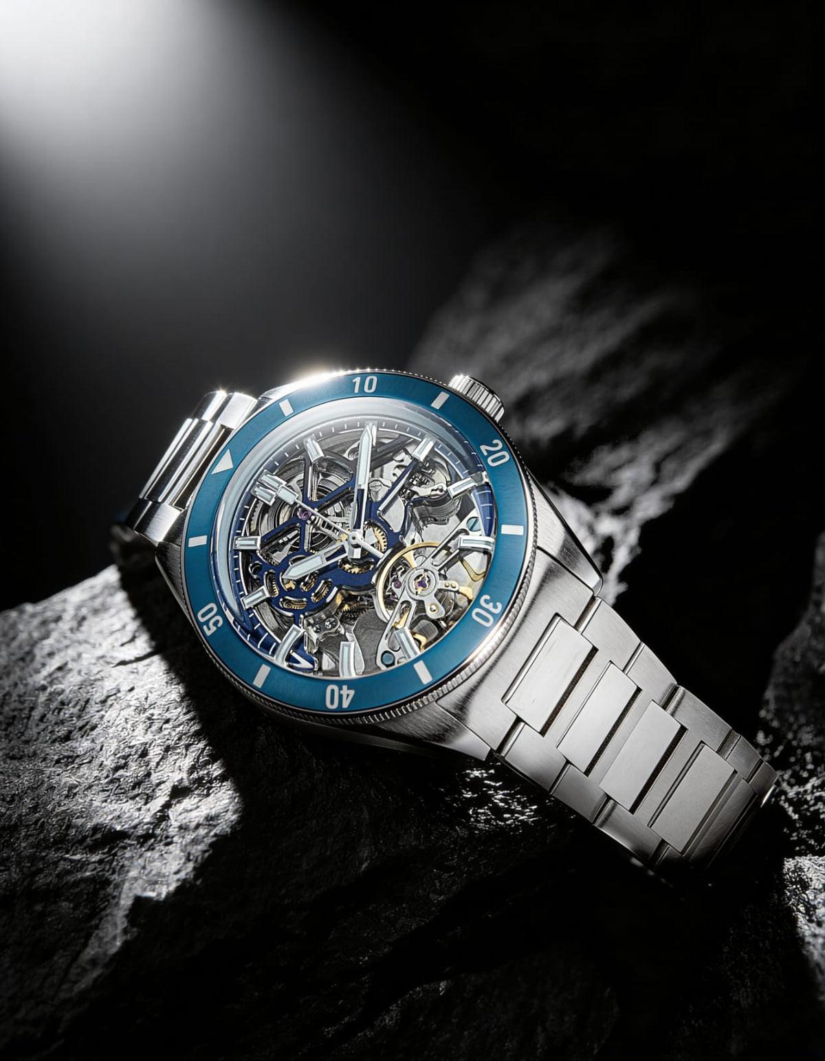 Equinox Steel Dial Blue Bezel Skeleton Watch