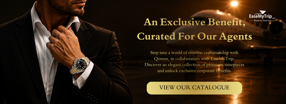 Promotional banner featuring a man in a black suit and white shirt adjusting his collar, with a wristwatch visible. The right side contains gold text reading 'An Exclusive Benefit, Curated For Our Agents' and a yellow button that says 'VIEW OUR CATALOGUE'.