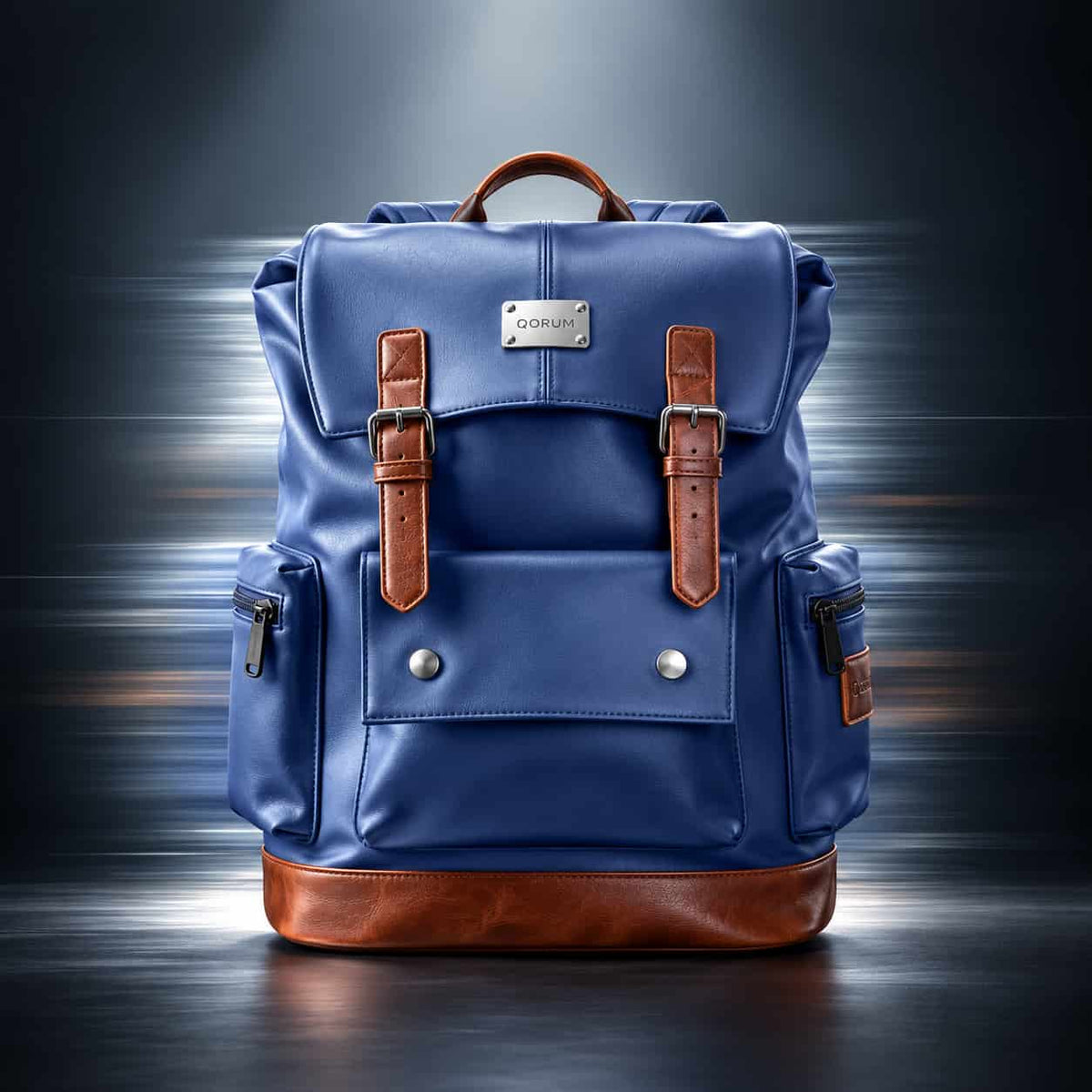 A blue leather backpack with brown leather straps and trim, featuring a silver-tone brand plaque on the front flap, set against a dark background with motion blur.